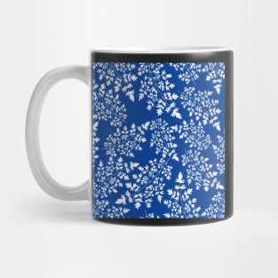 Hedgerow ferns in while on blue Mug